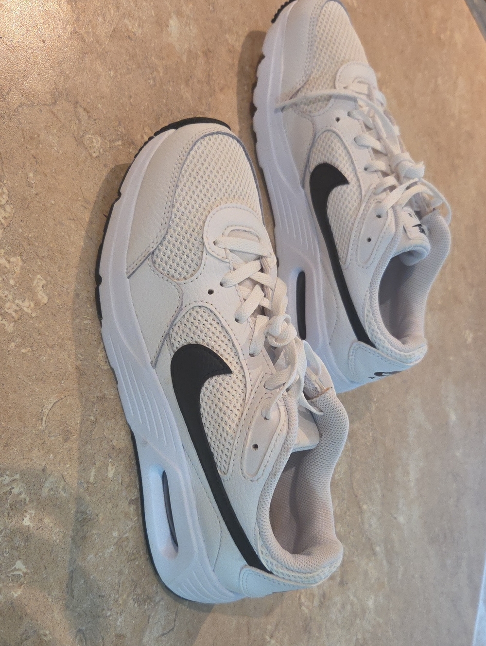 Nike Kids White Sneakers with Black Swoosh